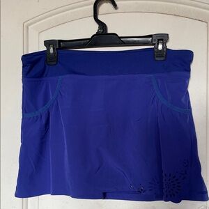 Athleta Blue Laser Cut Tennis Skiort 
Size Medium